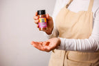 Hand holding Mexican chorizo seasoning bottle and spice, gluten-free keto seasoning blend